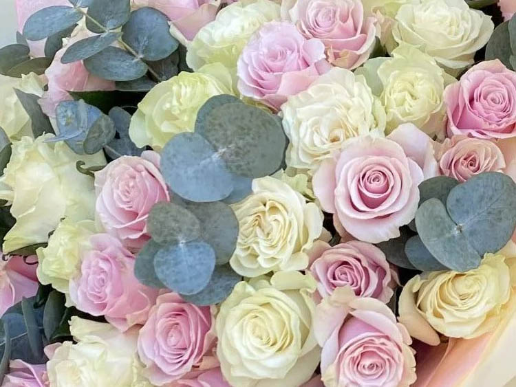 Elegant corporate flower arrangements in a reception area